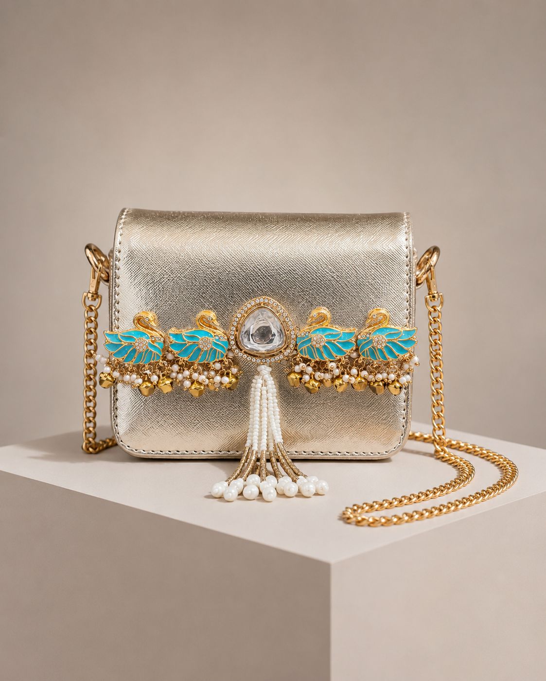 The Rajkumari Swan Metallic Mini Clutch Bag with Sling Chain