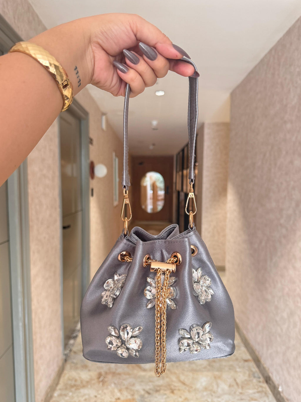 Embellished Satin Potli Bags with Crystal Floral Work