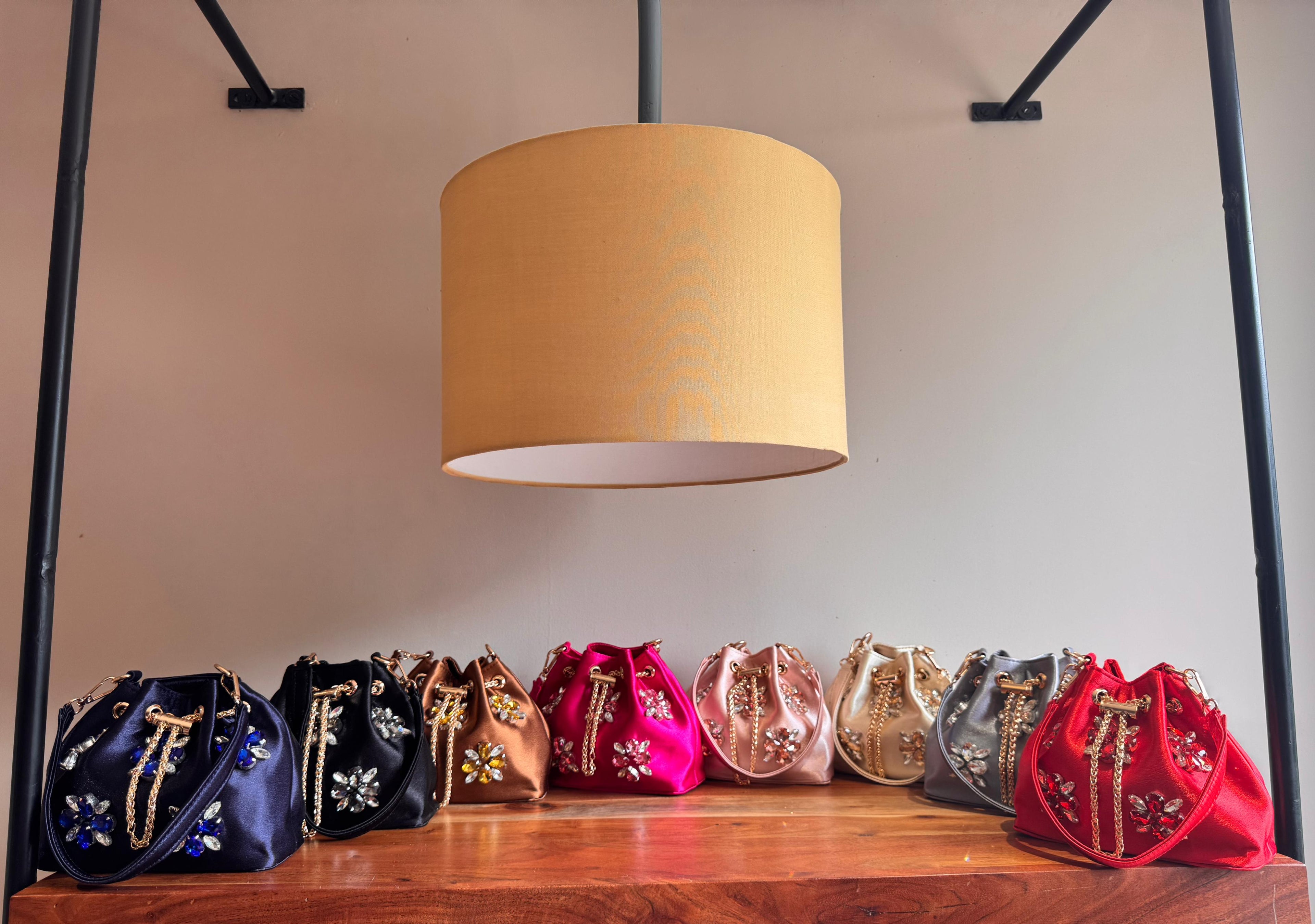 Embellished Satin Potli Bags with Crystal Floral Work