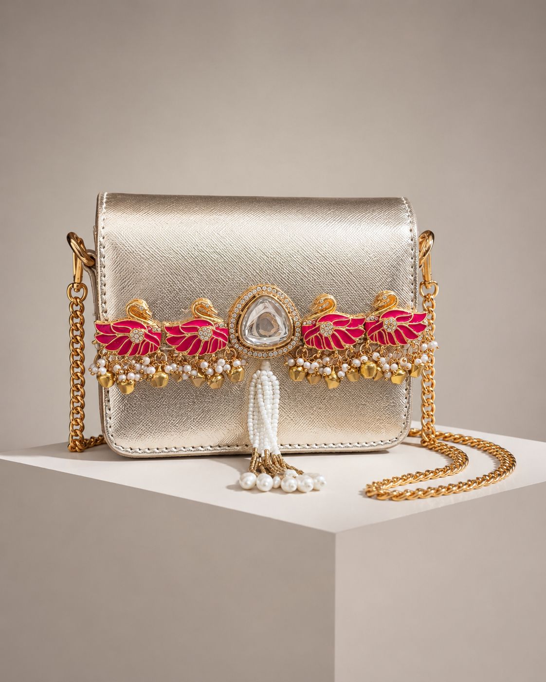 The Rajkumari Swan Metallic Mini Clutch Bag with Sling Chain