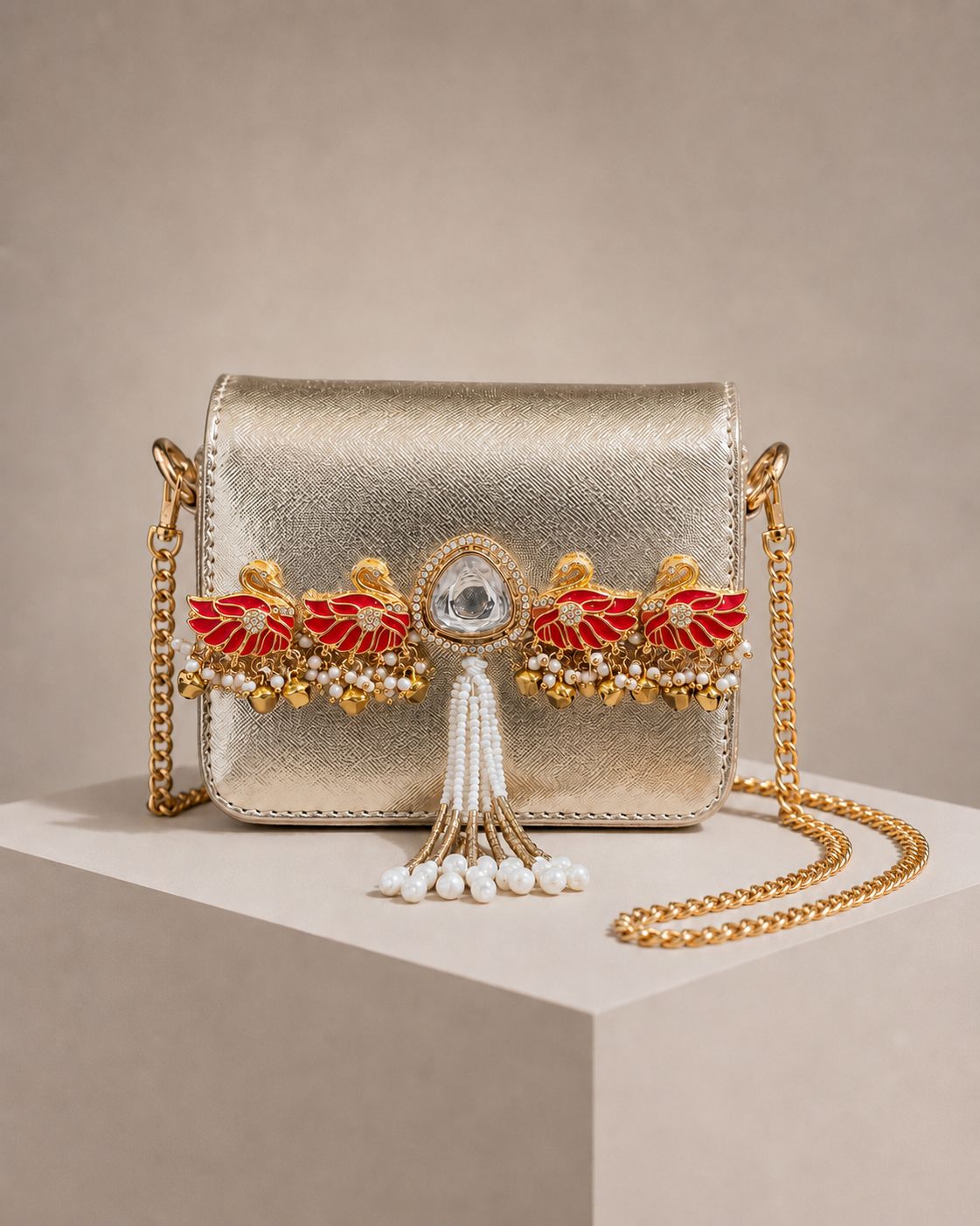 The Rajkumari Swan Metallic Mini Clutch Bag with Sling Chain