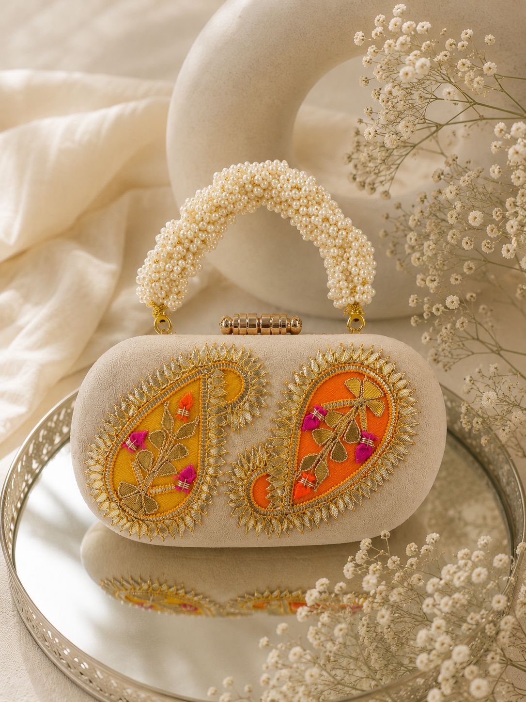 The Keri Pearl Clutch