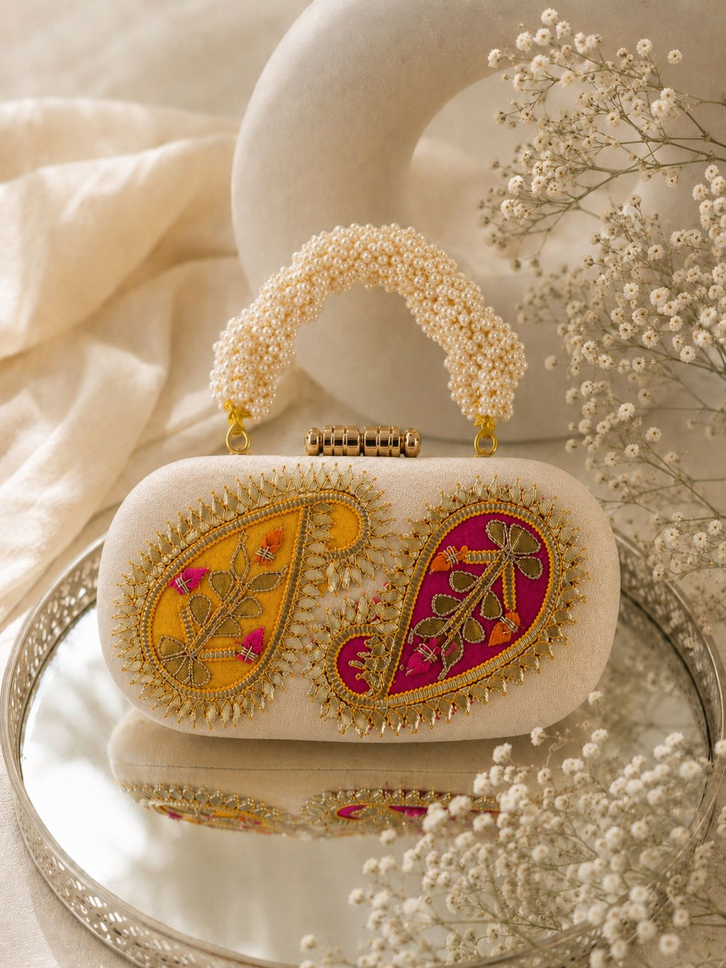 The Keri Pearl Clutch