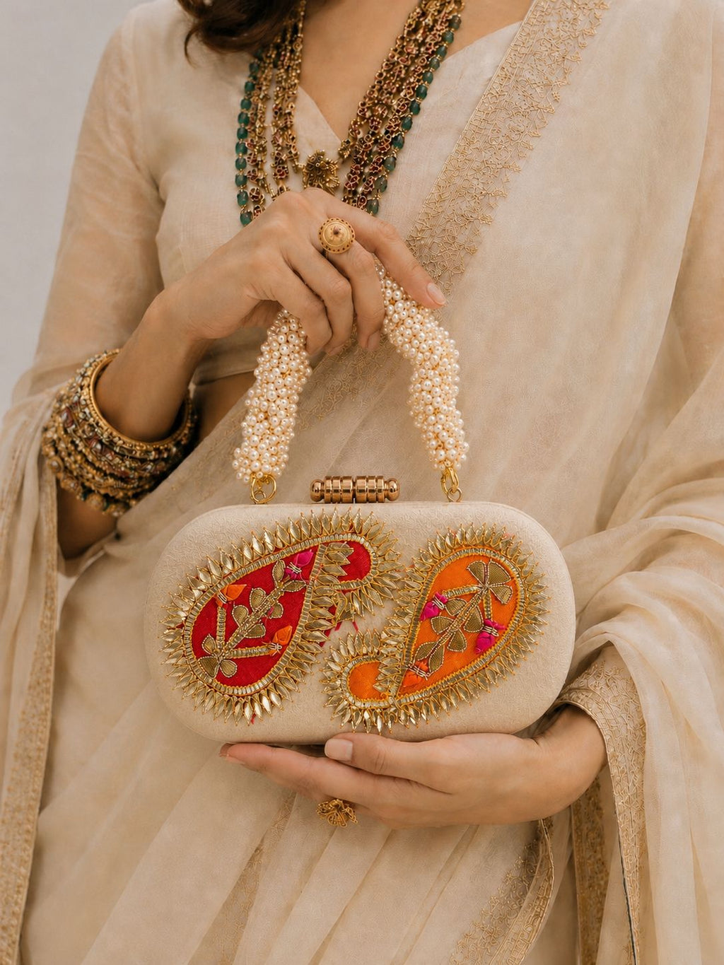 The Keri Pearl Clutch