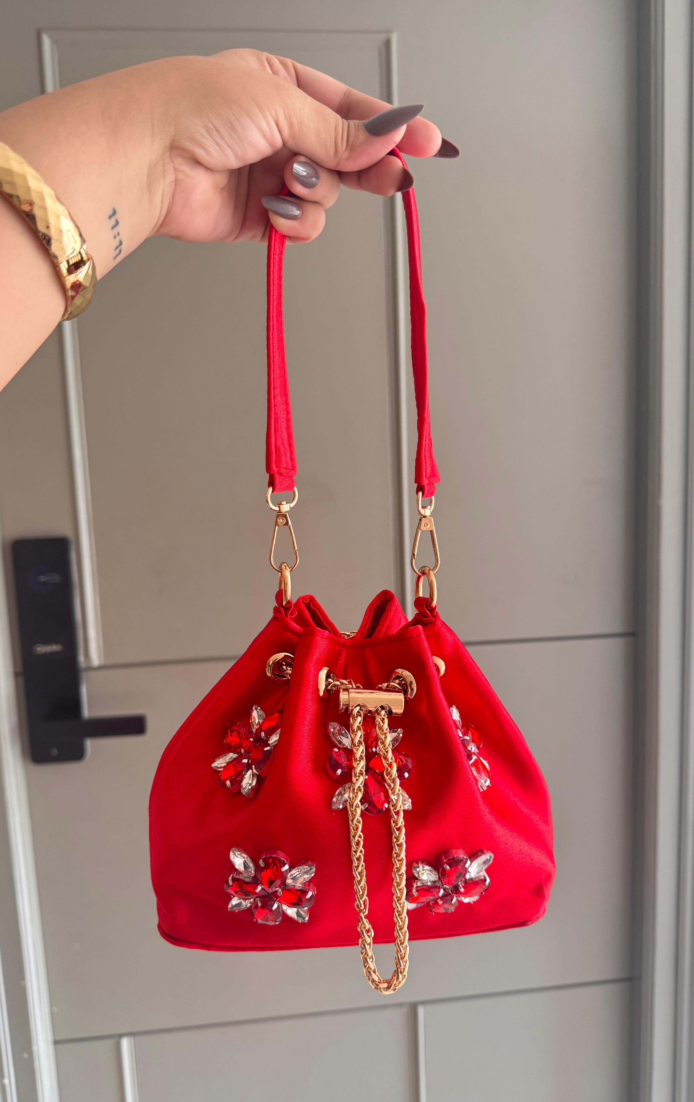 Embellished Satin Potli Bags with Crystal Floral Work
